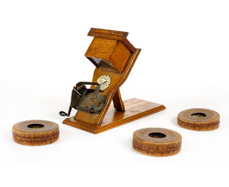 * Kinora of London flicker book viewer. "The Kinora" of London flicker book viewer, early 20th century, wooden model in golde