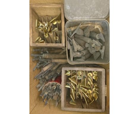 * Decorative finishing tools. A collection of 35 brass finishing tools, comprising mostly centre tools of traditional design,
