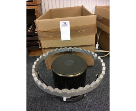 * Finishing Stove. An modern electrically powered finishing stove with thermostat control, with 31cm (12.25 inch) diameter to