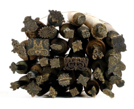 * Decorative finishing tools. 30 decorative brass finishing tools, mostly centre tools of traditional design, makers include 