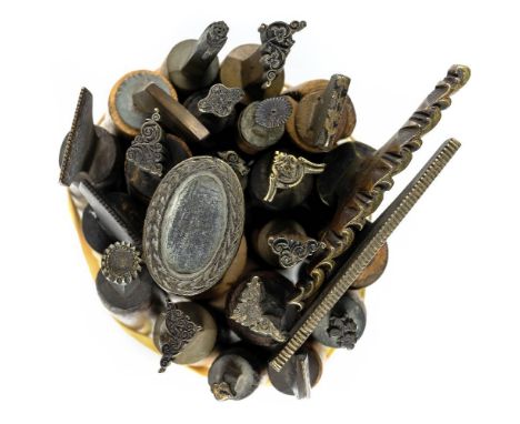 * Decorative finishing tools. A collection of 15 brass decorative finishing tools, comprising mostly centre and few corner to