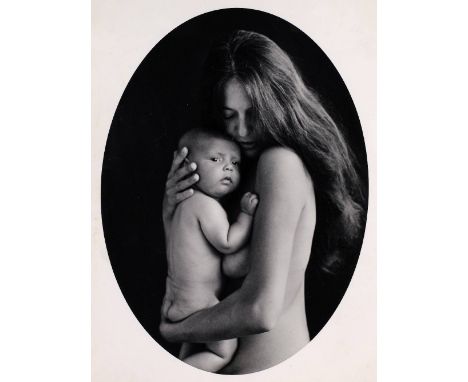 * Bernhard (Ruth, 1905-2006). Profile portrait of a nude woman with long hair holding her young baby, circa 1960s, oval gelat