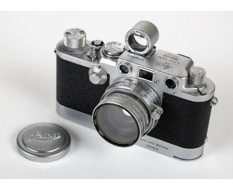 * Leica IIIf rangefinder (1951) with Summitar 50mm f/2 lens and Leicavit winder. Leica IIIf chrome rangefinder camera, Serial