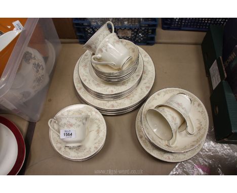 A part Royal Doulton 'Diana' pattern dinner service including cups, saucers, dinner plates, soup bowls, tea plates etc.