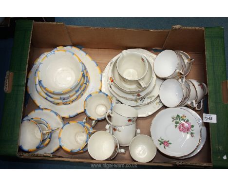 A yellow and blue Teaset including cake plates, side plates and cups/saucers, another Teaset including 6 plates, side plates,