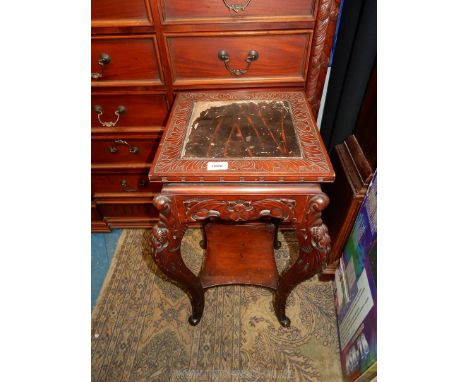 A darkwood chinosierie design occasional Table standing on shaped and carved legs united by a lower shelf, 16 1/2'' x 16 1/2'