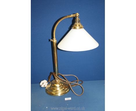 A brass desk lamp with white glass coolie shade, dent to base, 21" tall.