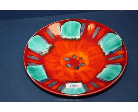 A small Poole Pottery charger in 'Volcano' pattern, 10 1/4'' diameter.