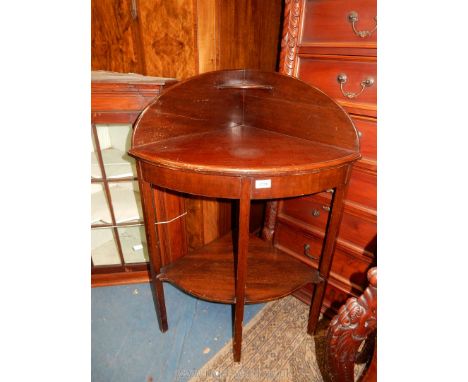 A Mahogany corner Washstand, 26 1/2'' wide x 38'' high, the legs united by a lower shelf.