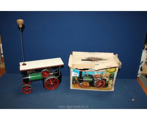 A Mamod Steam Traction Engine, in original distressed box.