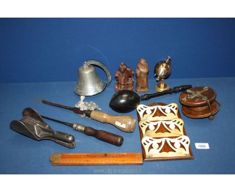 A small quantity of miscellanea including wooden fishing reels, carved figures, 'Prince Globe Star' table gas lighter, chisel