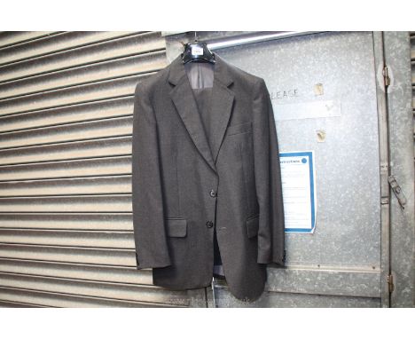 A gent's grey Guards suit by S. Schneiders &amp; Son Ltd, jacket 40'' chest, trousers 34'' waist x 31'' leg.