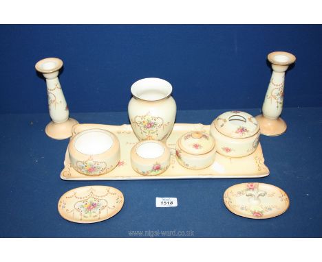 A Crown Ducal blush dressing Table set including tray, candlestick, vase, ring dish, pots etc.