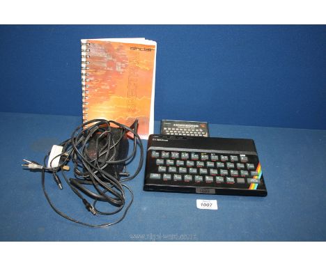 A Sinclair 2x Spectrum with manual, Horizons software starter pack etc.