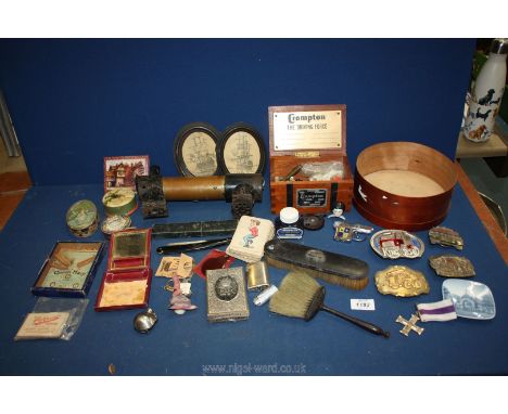 A quantity of miscellanea including hand made train, playing cards, vintage games, scrimshaw pictures, American truck belt bu
