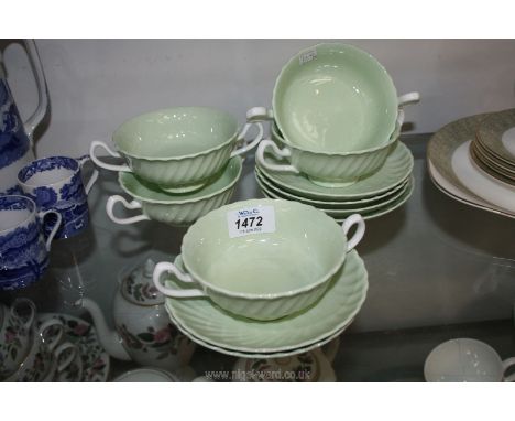 Five pale green and white Minton soup cups and six saucers.