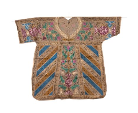 An Ottoman Talismanic Shirt with Multicolored Calligraphic Inscriptions and Floral Motifs.A talismanic shirt featuring intric