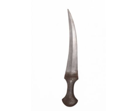 **NO RESERVE**An Indo Persian Steel Dagger with Engraved Hilt.An Indo-Persian dagger featuring a curving steel blade with a s