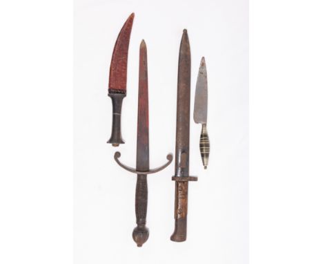 **NO RESERVE**A Mixed Lot of Four Daggers and Knives.A diverse collection of four daggers and knives, each exhibiting distinc