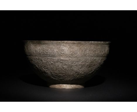 **NO RESERVE**A Late Qajar Tinned Copper Bowl with Engraved Calligraphy and Hunting Motifs, 20th Century.A copper bowl with a