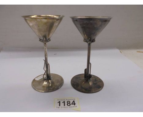 A pair of early 20th century silver goblets by J D & S.Height 133mm, Base 68mm, Rim 72mm. Sheffield 1931. 113.59 grams & 117.