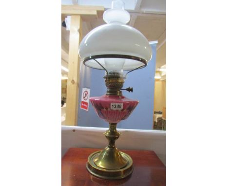 A brass bases oil lamp with hand painted pink font with mushroom font. COLLECT ONLY.