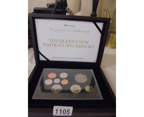 A cased 'the Queen's New Portrait Speciman' coin set No. 995.