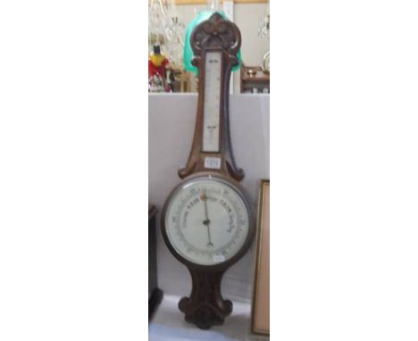 A good quality oak barometer/thermometer,. COLLECT ONLY.