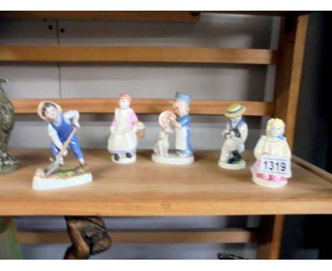 A Royal Worcester figurine and four others.