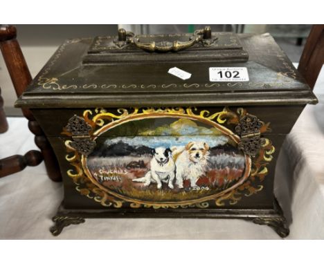 An ornately decorated wooden casket