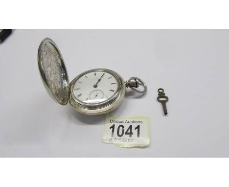 A US Illinois watch company silver plate railway watch, mid-late 20th century. with key.