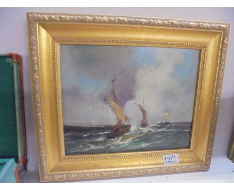 A gilt framed oil on board seascape, 39.5 x 33.5 cm. COLLECT ONLY