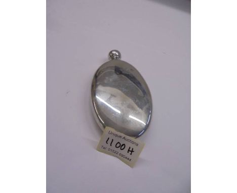 A European silver hip flask.