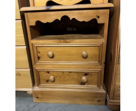 A solid waxed pine bedside chest with 2 drawers &amp; shelf