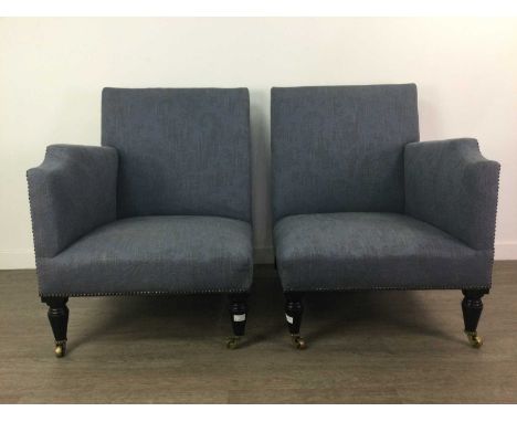 PAIR OF CORNER CHAIRS OF CONTEMPORARY DESIGN,in studded pale blue upholstery with horsehair stuffed seats, raised on ebony su