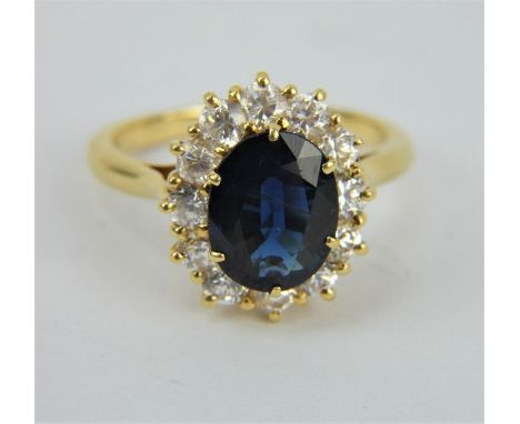 An 18ct yellow gold 4.5ct sapphire and diamond (approx 1.5ct) cocktail ring. Size Q. Gross weight: 6.8 grams


***AWAY***&nbs