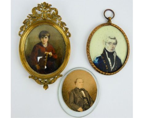 Three antique male portrait miniatures, two in ornate gilt brass frames, one unframed. Largest portrait: 6cm x 7cm (3)