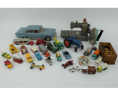 Mixed lot of unboxed toy cars, toy sewing machine, West German toy car, chess set, etc