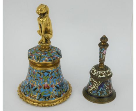 Two gilt brass and champleve enamel table bells, one with puma shape handle. Tallest 13cm.