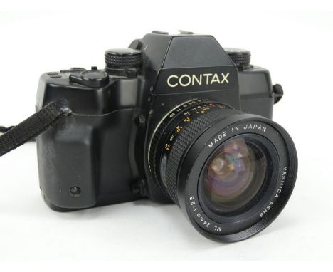 Contax ST 35mm camera, number 002687, with Yashica 24mm f2.8 lens and manual.