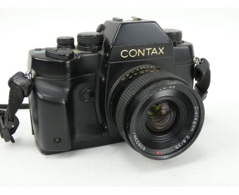 Contax RX 35mm camera, number 005553,&nbsp; with Disatagon 35mm f2.8 lens and manual.