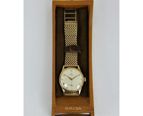 A 1950s 9ct Gold Omega 266 Gentleman's watch with two 9ct gold bracelets, both fully hallmarked. 9ct gold Dennison case, cham