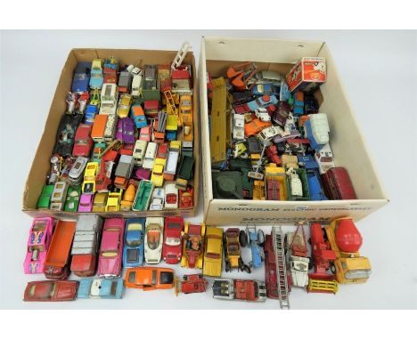 Large collection of vintage toy cars including Dinky, Corgi, Matchbox etc. Cars include To & Jerry, Basil Brush, Batmobile et