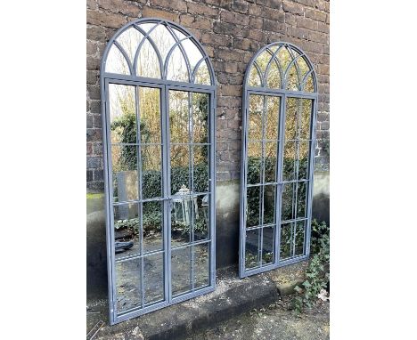 ARCHITECTURAL GARDEN MIRRORS, a pair, Regency style, gated design, 180cm x 75cm. (2) 