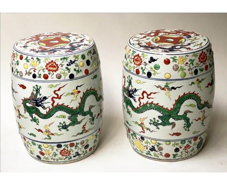 CHINESE DRAGON STOOLS, a pair, ceramic pierced barrel form, 42cm H. (2) 