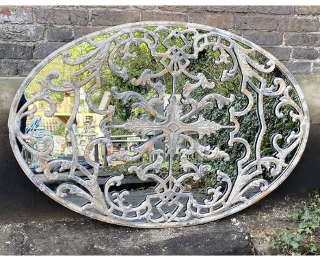 ARCHITECTURAL WALL MIRROR, large oval, 151cm x 102cm, scrolled overlaid cast design over mirror. 
