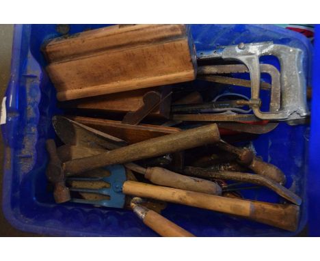 Box containing various garden and workshop tools