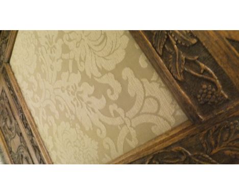 A carved oak side chair in the Carolean taste, with gryphon carved top rail, together with an Edwardian bedroom chair with te