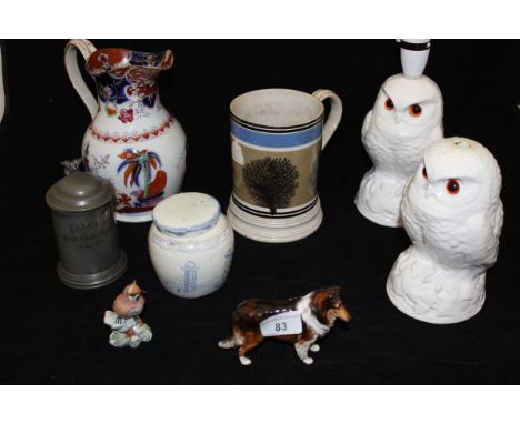 A Royal Doulton figure of a collie dog, Royal Worcester figure "Wax Wing" (3648), two Poole owl lamp bases, a fern ware mug, 