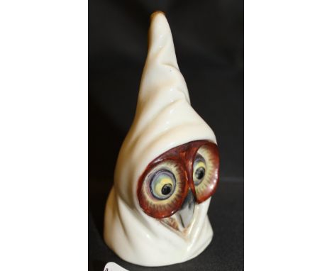 A Royal Worcester candle snuffer "Hooded Owl" date marked for 1909 
